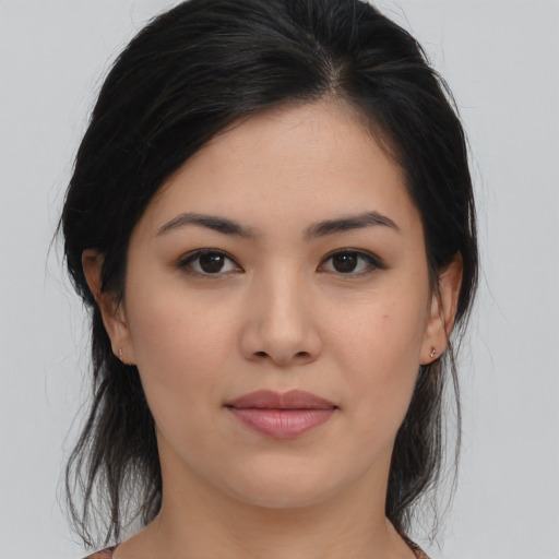 Joyful asian young-adult female with medium  brown hair and brown eyes