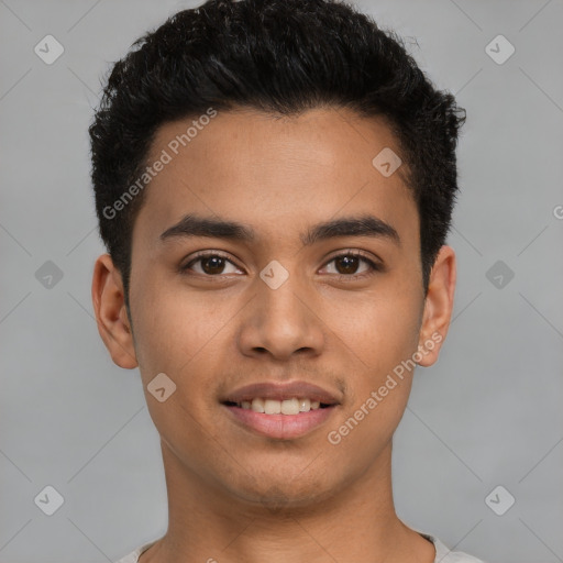 Joyful latino young-adult male with short  brown hair and brown eyes