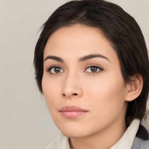 Neutral white young-adult female with medium  brown hair and brown eyes