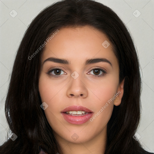 Joyful white young-adult female with long  black hair and brown eyes