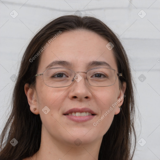 Joyful white adult female with long  brown hair and brown eyes