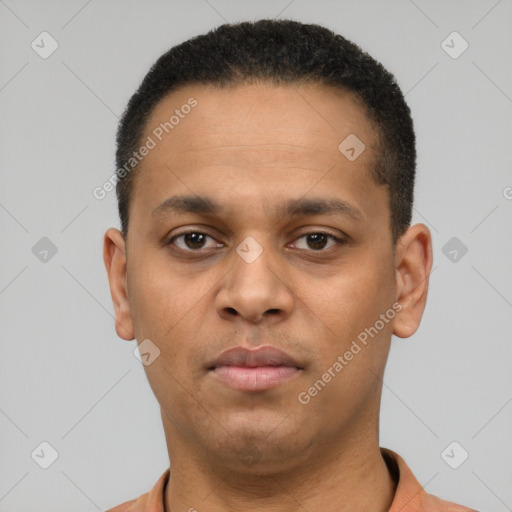 Neutral latino young-adult male with short  black hair and brown eyes