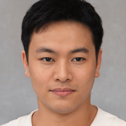 Neutral asian young-adult male with short  black hair and brown eyes