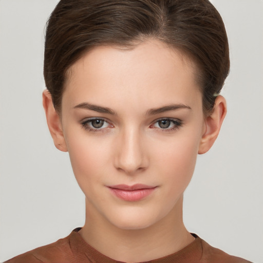 Neutral white young-adult female with short  brown hair and brown eyes