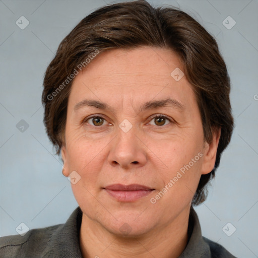 Joyful white adult female with short  brown hair and brown eyes