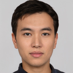 Neutral asian young-adult male with short  brown hair and brown eyes