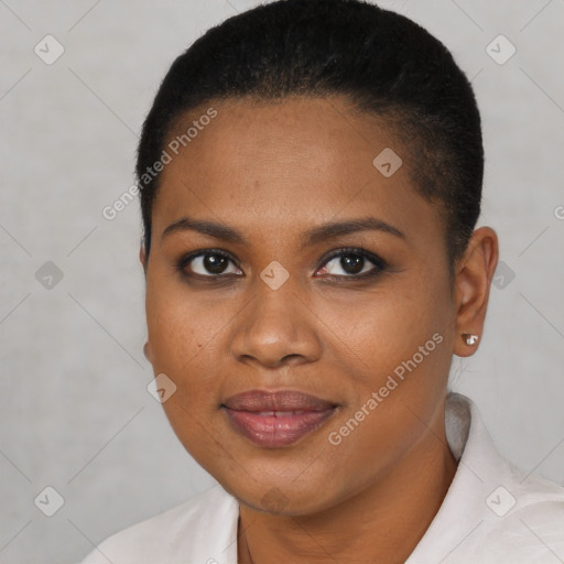 Joyful black young-adult female with short  brown hair and brown eyes