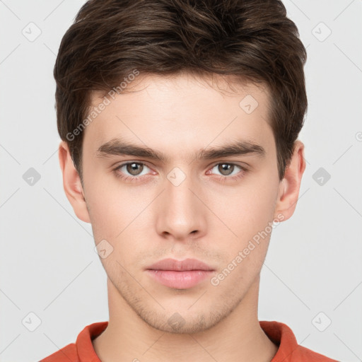 Neutral white young-adult male with short  brown hair and brown eyes