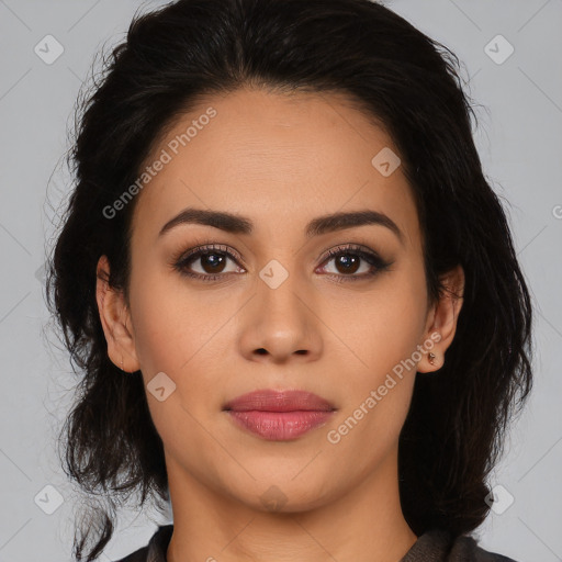 Joyful latino young-adult female with medium  brown hair and brown eyes