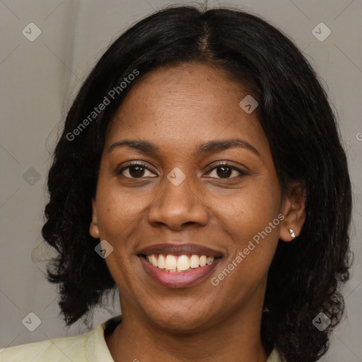 Joyful black young-adult female with medium  brown hair and brown eyes