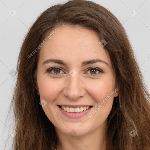 Joyful white young-adult female with long  brown hair and brown eyes