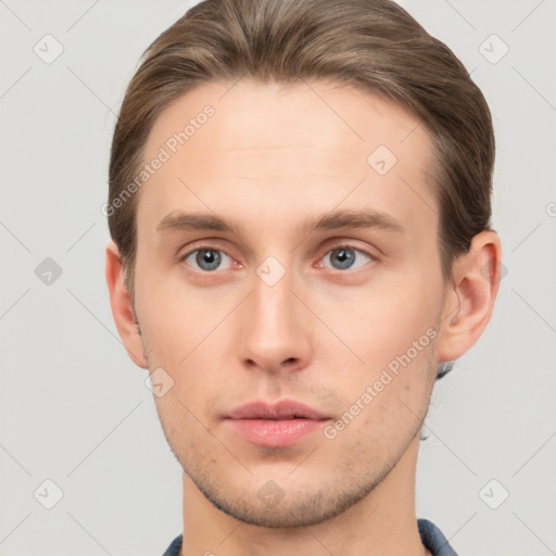 Neutral white young-adult male with short  brown hair and grey eyes