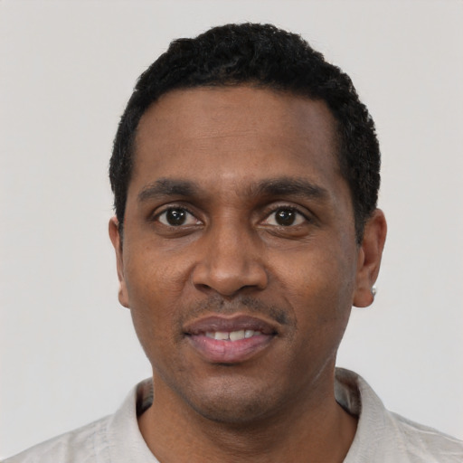 Neutral black young-adult male with short  black hair and brown eyes