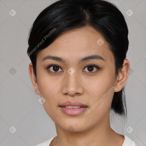 Joyful asian young-adult female with medium  black hair and brown eyes