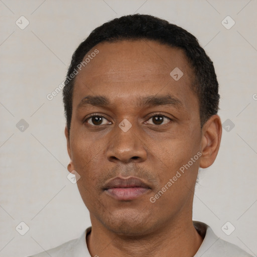 Neutral black adult male with short  black hair and brown eyes