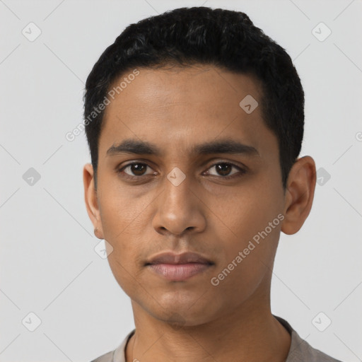 Neutral latino young-adult male with short  black hair and brown eyes