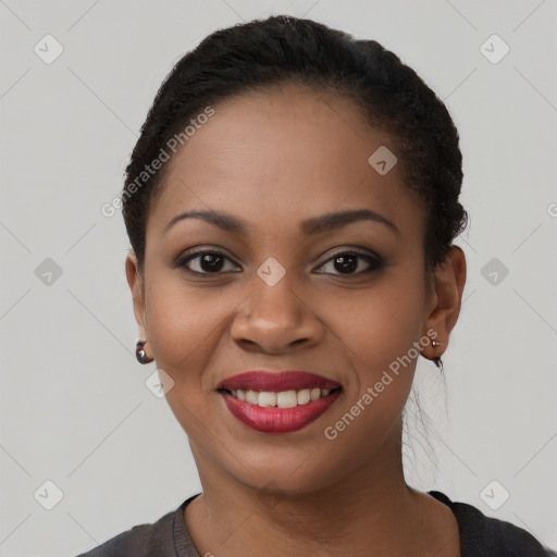 Joyful black young-adult female with short  black hair and brown eyes