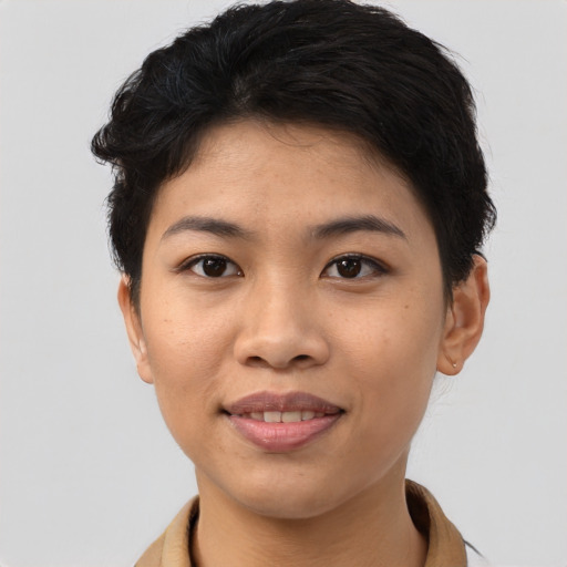 Joyful asian young-adult female with short  black hair and brown eyes