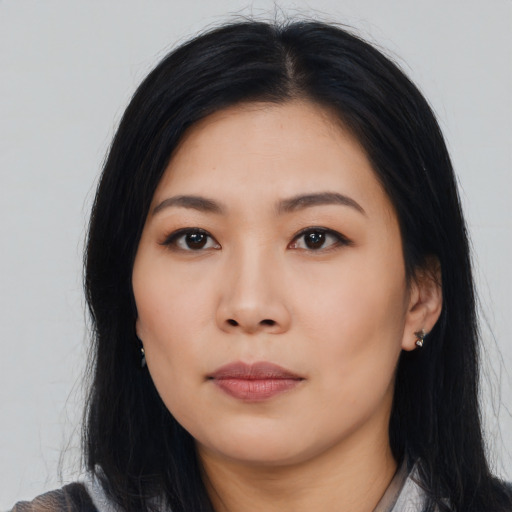 Neutral asian young-adult female with long  black hair and brown eyes