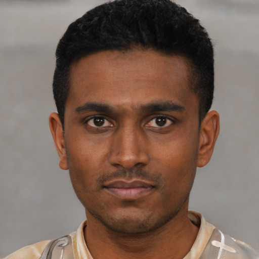 Neutral latino young-adult male with short  black hair and brown eyes
