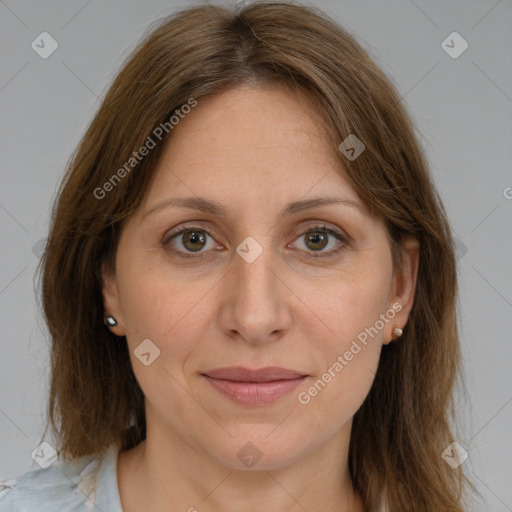 Joyful white adult female with medium  brown hair and grey eyes