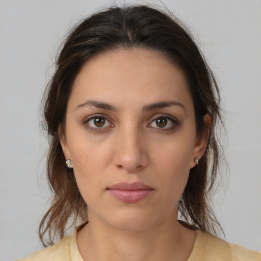 Neutral white young-adult female with medium  brown hair and brown eyes