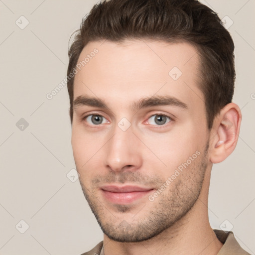 Neutral white young-adult male with short  brown hair and brown eyes