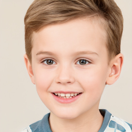 Joyful white child female with short  brown hair and grey eyes