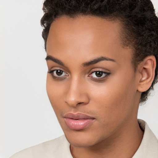 Neutral white young-adult female with short  brown hair and brown eyes