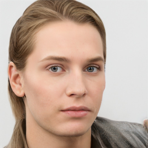 Neutral white young-adult male with long  brown hair and grey eyes