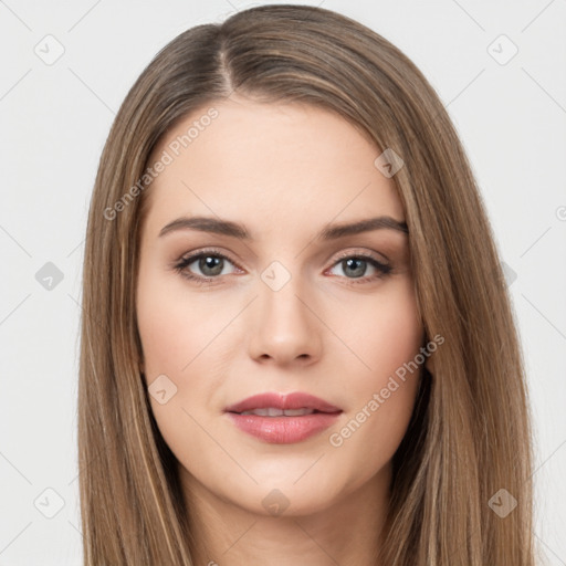 Neutral white young-adult female with long  brown hair and brown eyes