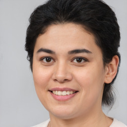 Joyful white young-adult female with medium  brown hair and brown eyes