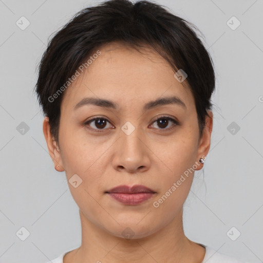 Joyful asian young-adult female with short  brown hair and brown eyes