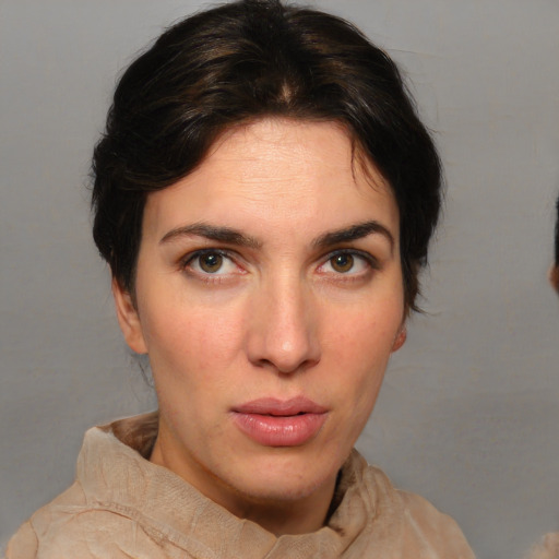 Neutral white young-adult female with short  brown hair and brown eyes