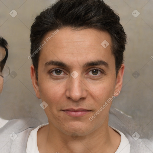 Joyful white adult male with short  brown hair and brown eyes