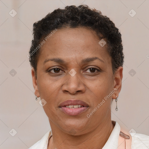 Joyful black adult female with short  brown hair and brown eyes