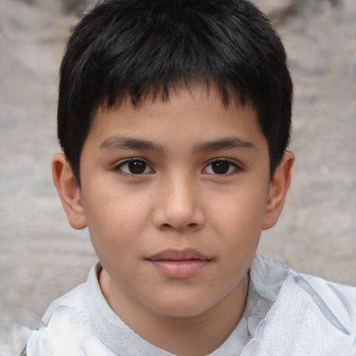 Joyful asian child male with short  brown hair and brown eyes