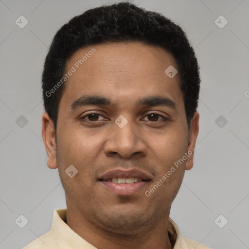 Joyful latino young-adult male with short  black hair and brown eyes