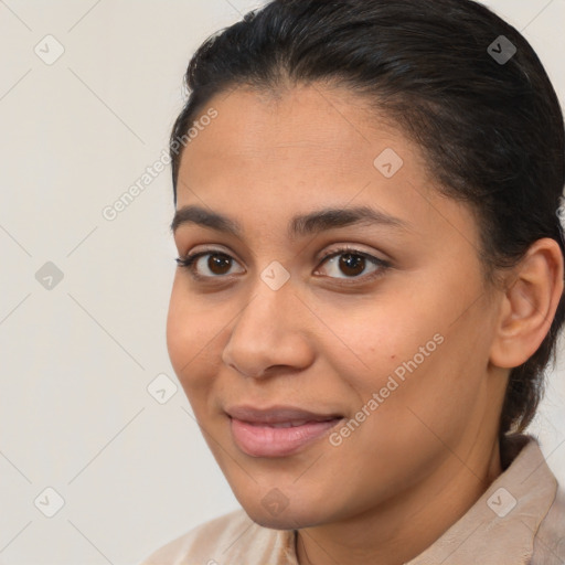 Joyful latino young-adult female with short  brown hair and brown eyes