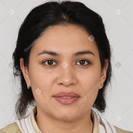 Joyful latino young-adult female with medium  brown hair and brown eyes