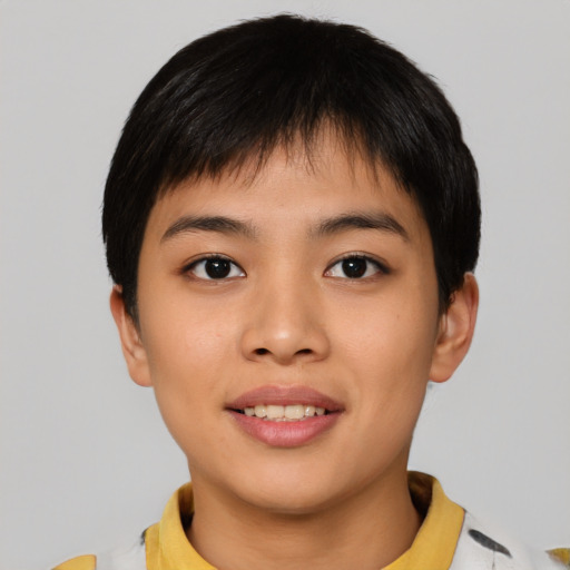 Joyful asian young-adult female with short  black hair and brown eyes