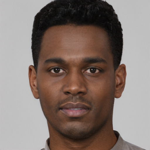 Neutral black young-adult male with short  black hair and brown eyes