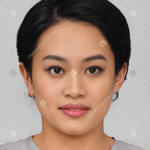 Joyful asian young-adult female with medium  black hair and brown eyes