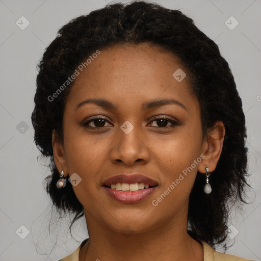 Joyful black young-adult female with medium  black hair and brown eyes