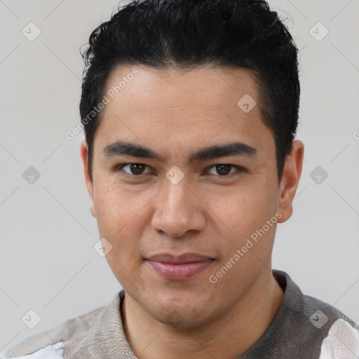 Joyful latino young-adult male with short  black hair and brown eyes