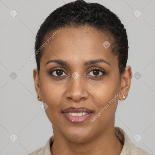 Joyful black young-adult female with short  brown hair and brown eyes