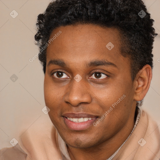 Joyful black young-adult male with short  brown hair and brown eyes