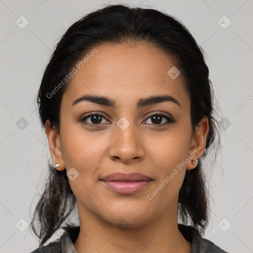 Joyful latino young-adult female with medium  black hair and brown eyes