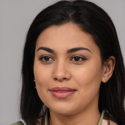 Joyful asian young-adult female with long  brown hair and brown eyes