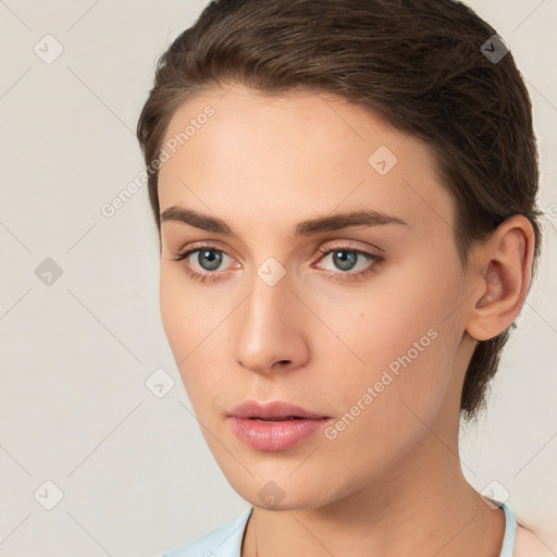 Neutral white young-adult female with short  brown hair and brown eyes